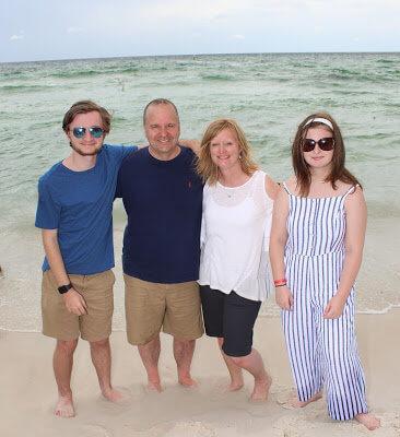 One of Dennis's passions outside of work is spending time at the beach with his family