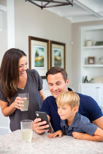 Family looking through our HomeSpotter App