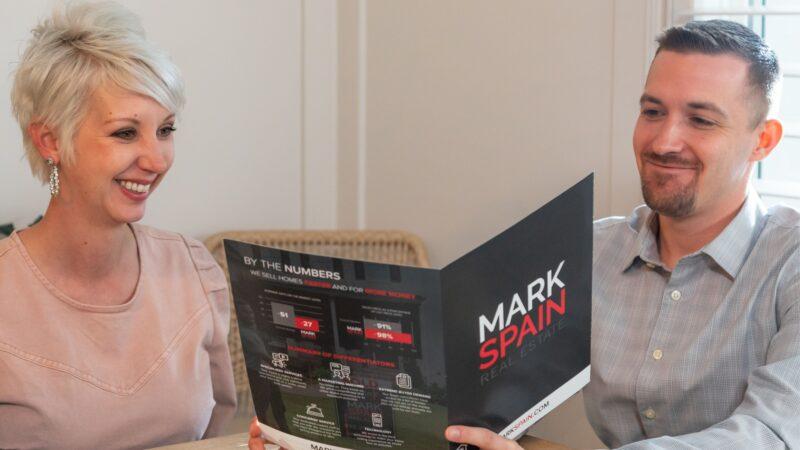 Learn more about selling your home with one of our agents, This agent is going over our selling programs 
