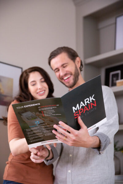 A happy couple knowing what to look for in a realtor