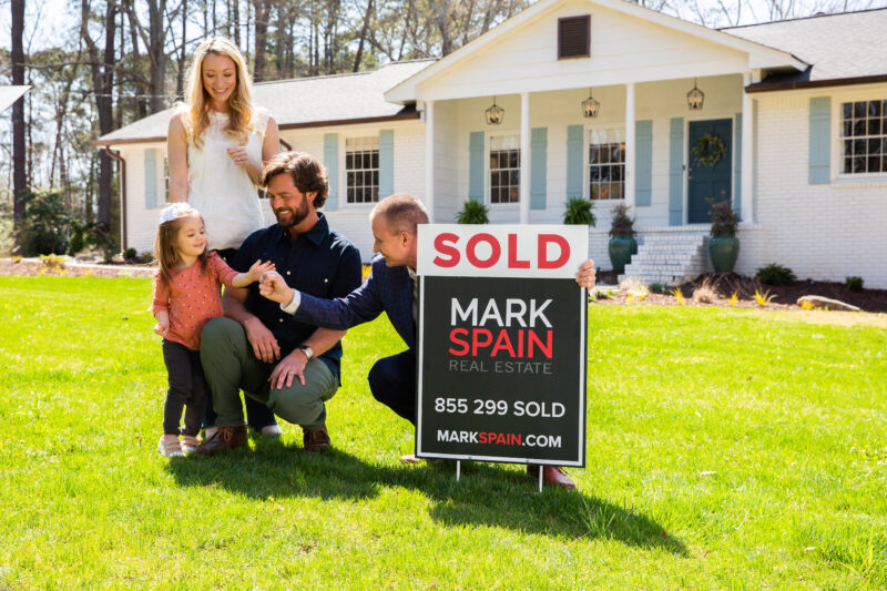 mark spain fistbumping after selling a home